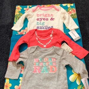 3 NWT Carter's Baby Long Sleeve Onesies. 3 months.